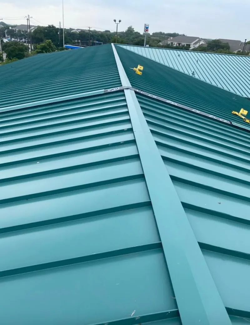 Green commercial metal roof ridge and valley for Metal Roof Repair in Mount Pleasant